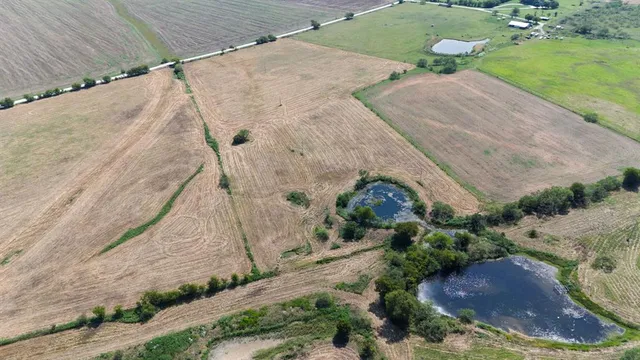 an aerial view of a houses with a outdoor space