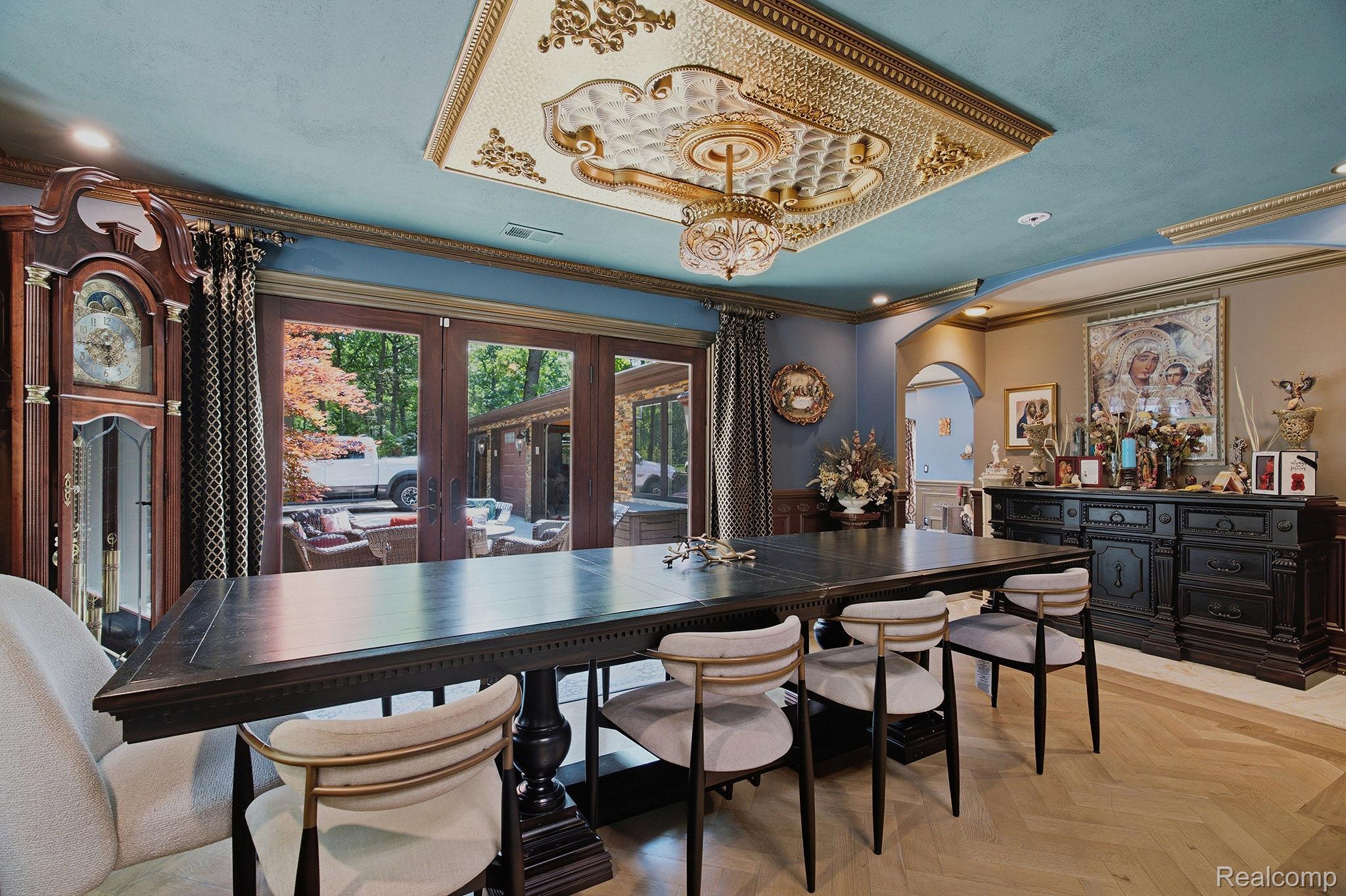 1258 Priscilla Lane Rochester, MI 48309 - Photo 18 of 56 Formal dining space featuring a decorative coffered ceiling with a central chandelier