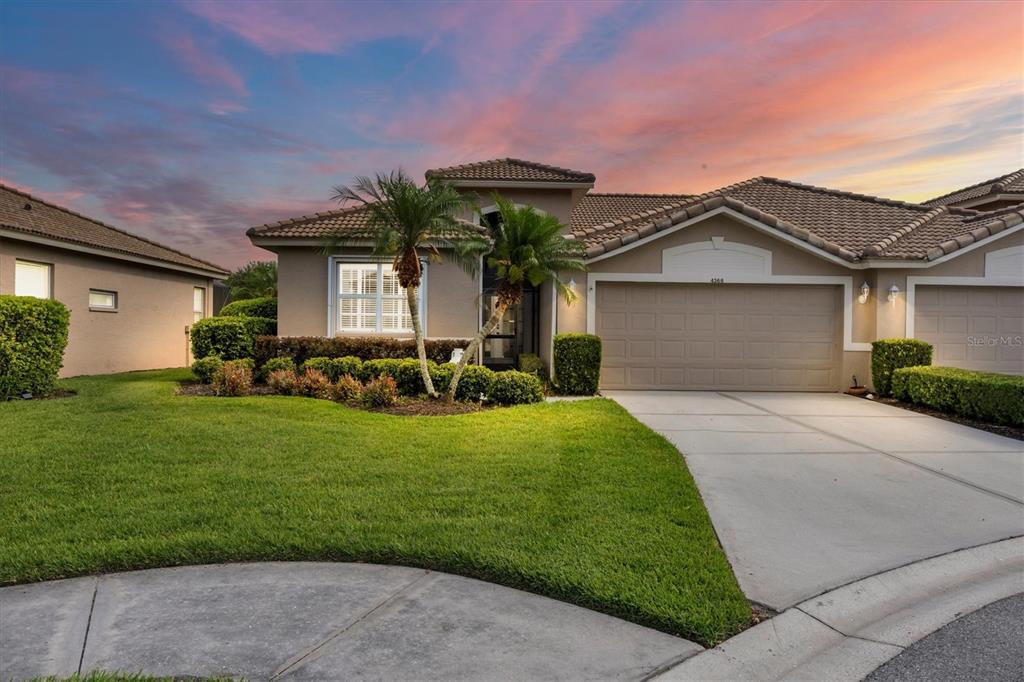 4366 Samoset Drive Sarasota, FL 34241 - Photo 1 of 1 a front view of a house with a garden