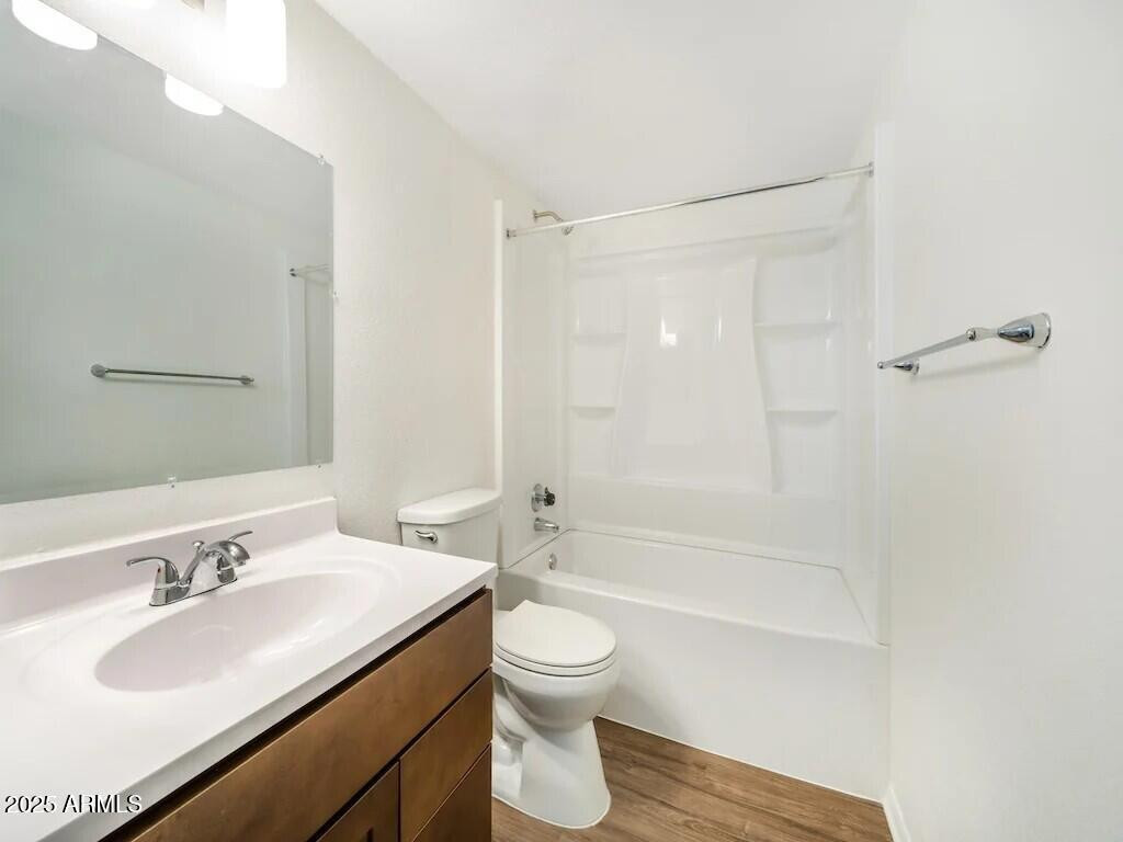2305 East Main Street, Unit 2 Mesa, AZ 85213 - Photo 6 of 12 a bathroom with a sink toilet tub and shower