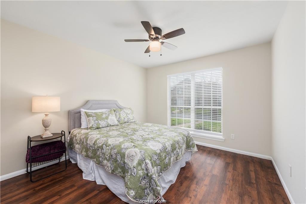 1221 Oney Hervey Drive College Station, TX 77840 - Photo 19 of 22 a bedroom with a large bed and a window