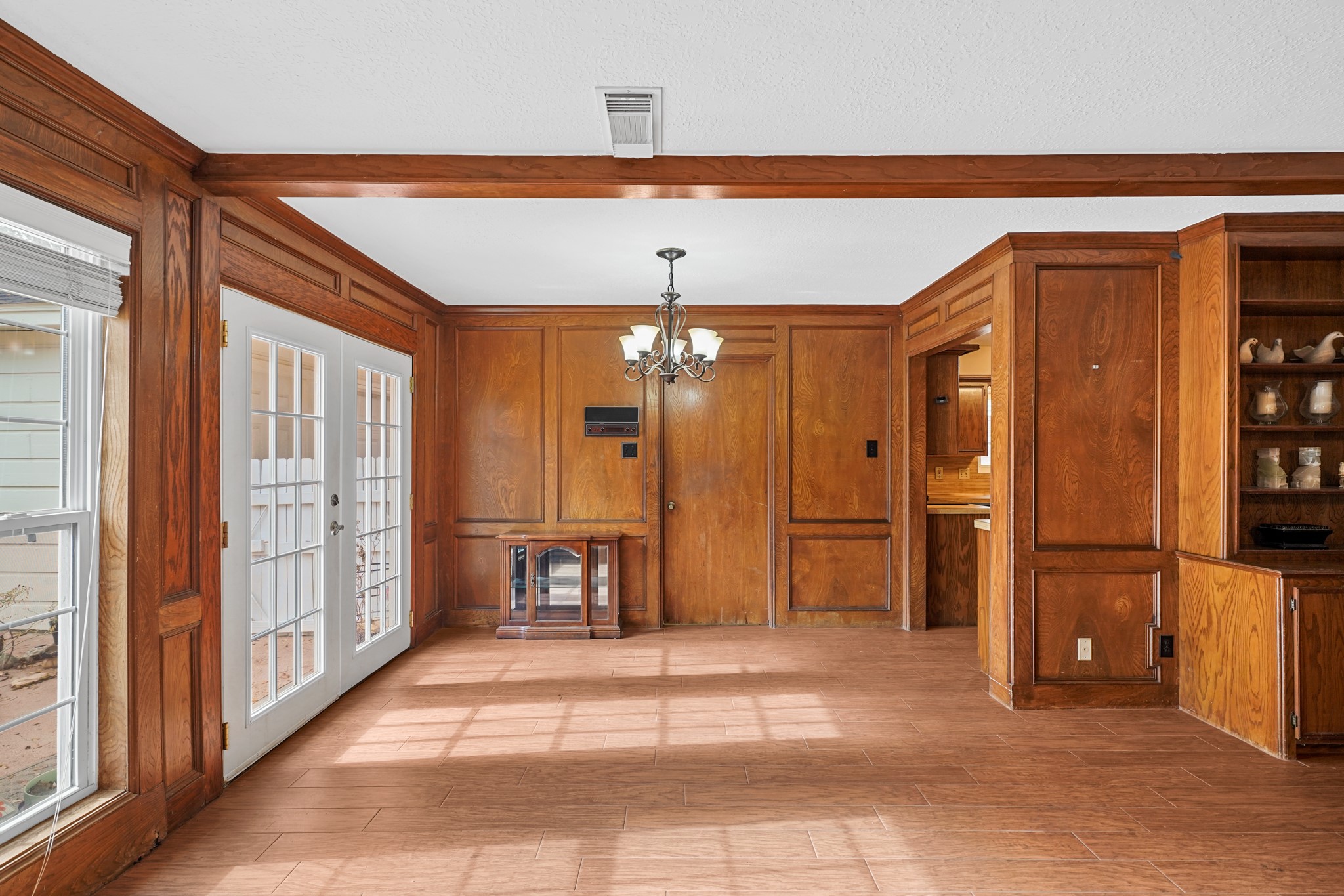 1706 Durfey Lane Katy, TX 77449 - Photo 20 of 29 a view of a hallway with wooden shelves