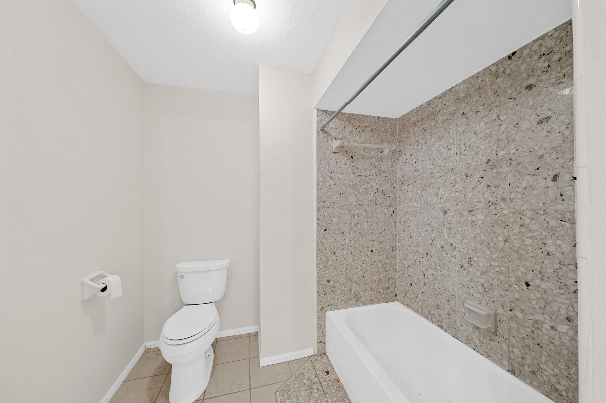 1706 Durfey Lane Katy, TX 77449 - Photo 25 of 29 a bathroom with a toilet and a shower
