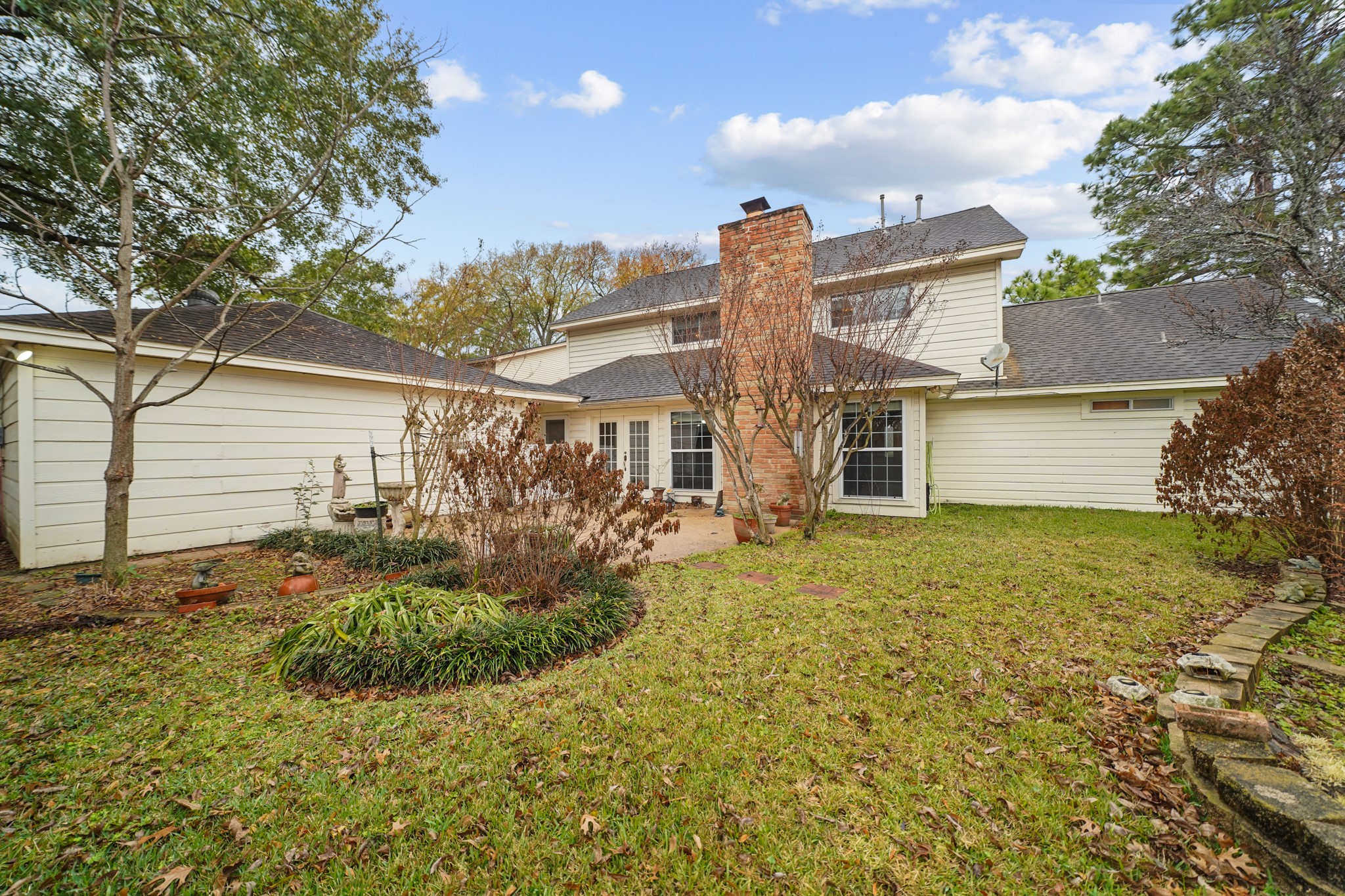 1706 Durfey Lane Katy, TX 77449 - Photo 5 of 29 a view of a house with backyard and garden