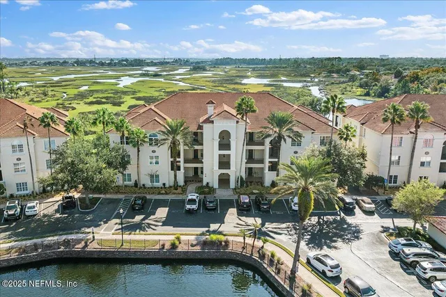 a view of a city with an ocean view