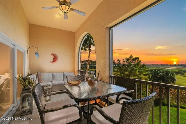 a living room with fireplace furniture and a flat screen tv