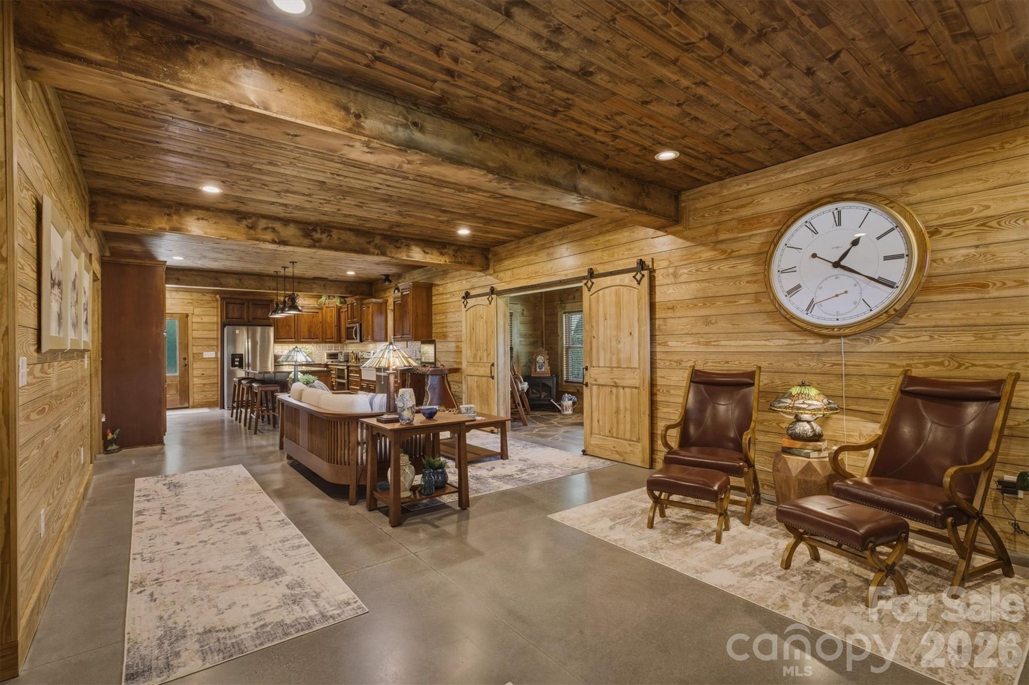 7490 Oak Ridge Church Road Connelly Springs, NC 28612 - Photo 10 of 44 a view of a dinning area with furniture and a clock