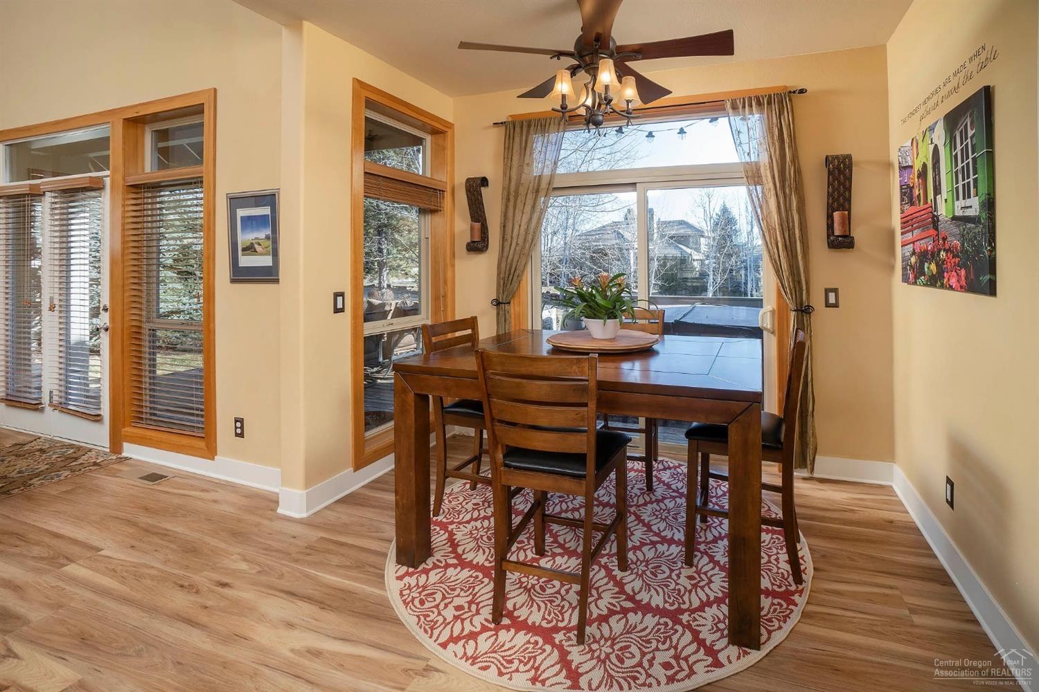 61842 Fall Creek Loop Bend, OR 97702 - Photo 7 of 22 Sunny breakfast nook opens to the large