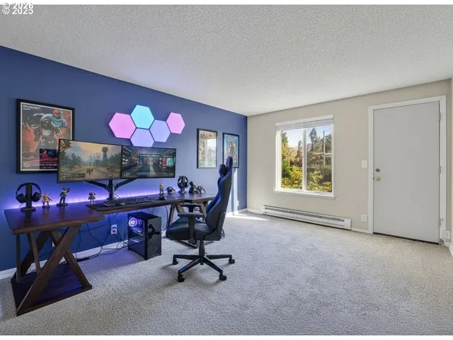 a view of a livingroom with furniture and a window