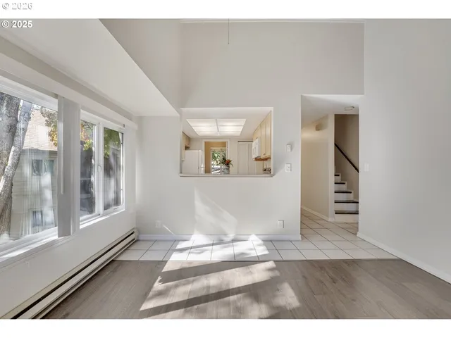 a kitchen with cabinets and appliances