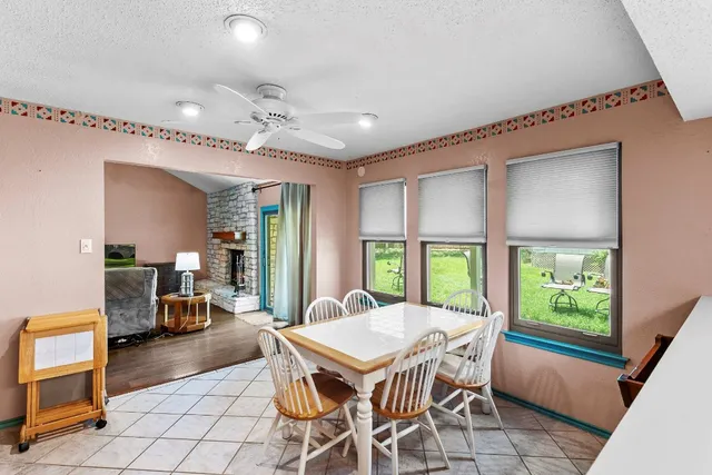 a outdoor space with a large window and couches