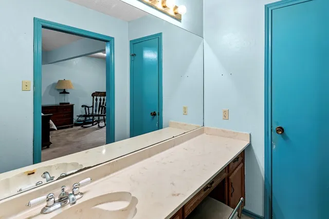 a room with a table and chairs