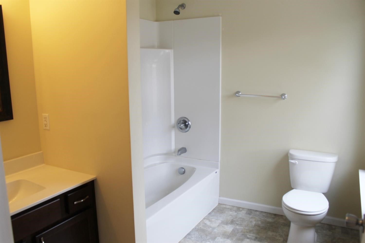 200 8th Avenue Northeast De Motte, IN 46310 - Photo 8 of 22 a bathroom with a bathtub and toilet