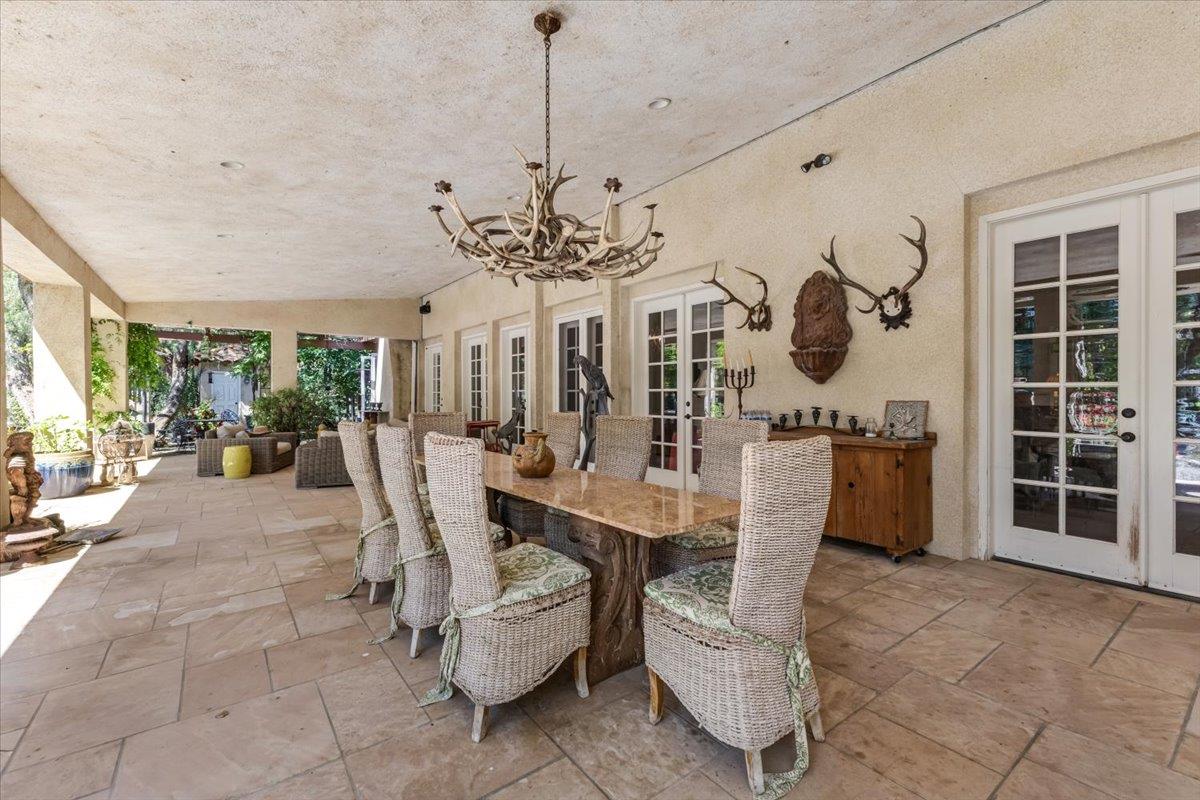 2727 Thomas Road Hollister, CA 95023 - Photo 38 of 83 a view of a dining room with furniture and chandelier
