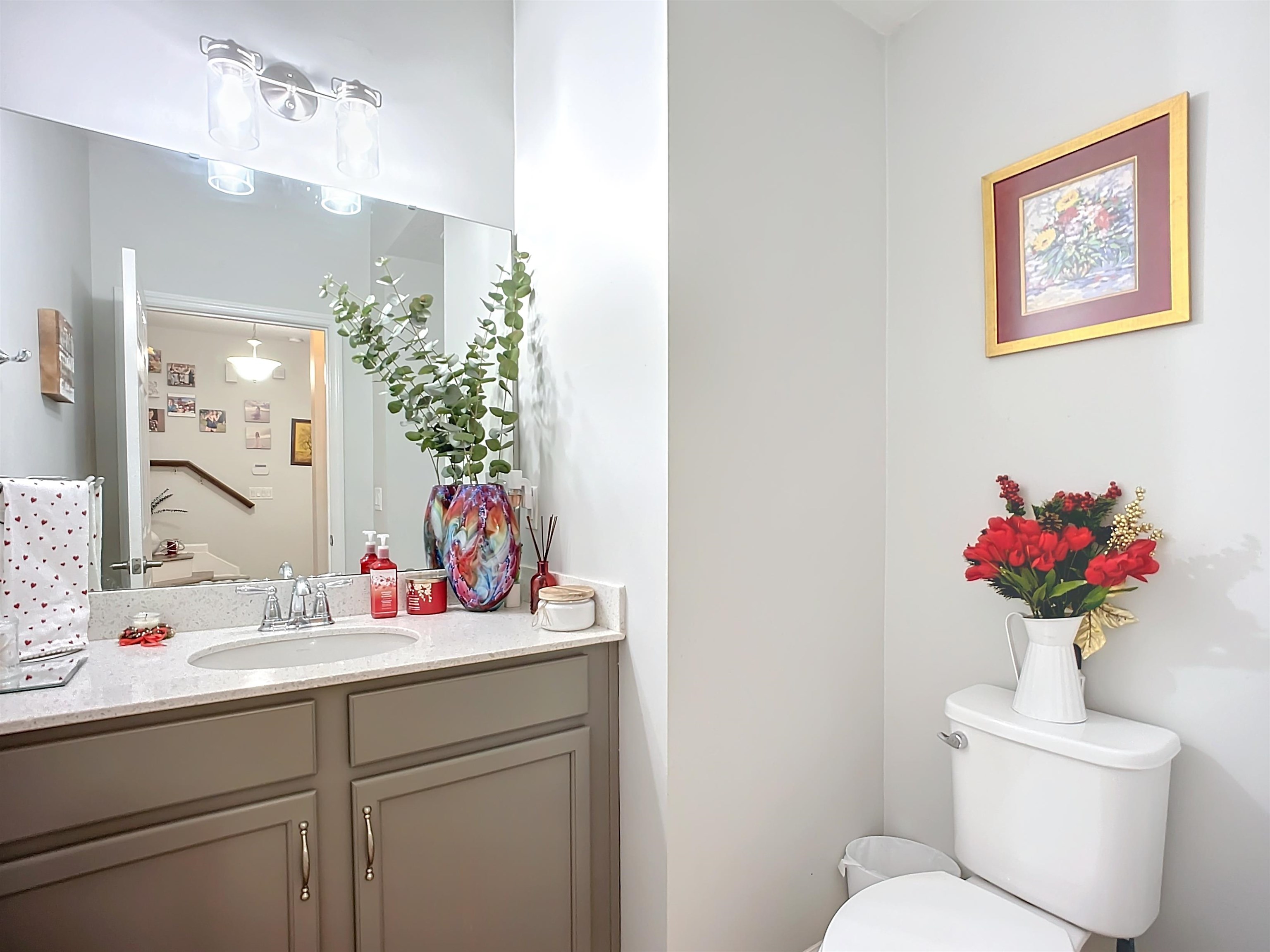 193 Paradas Place St. Augustine, FL 32092 - Photo 15 of 44 a bathroom with a toilet sink and mirror