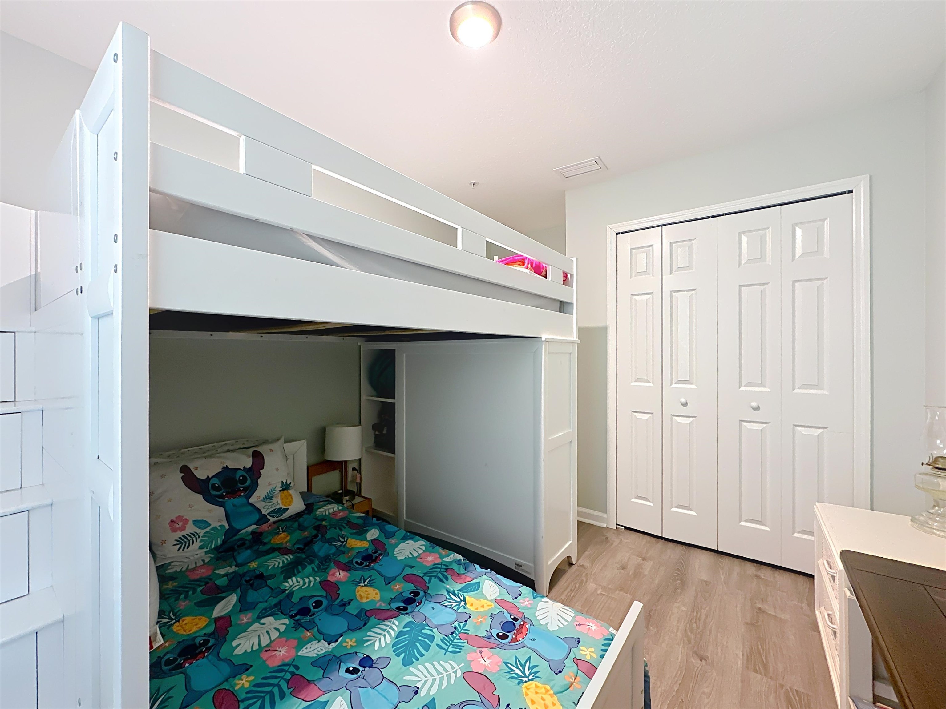 193 Paradas Place St. Augustine, FL 32092 - Photo 21 of 44 a bedroom with a bed and a window