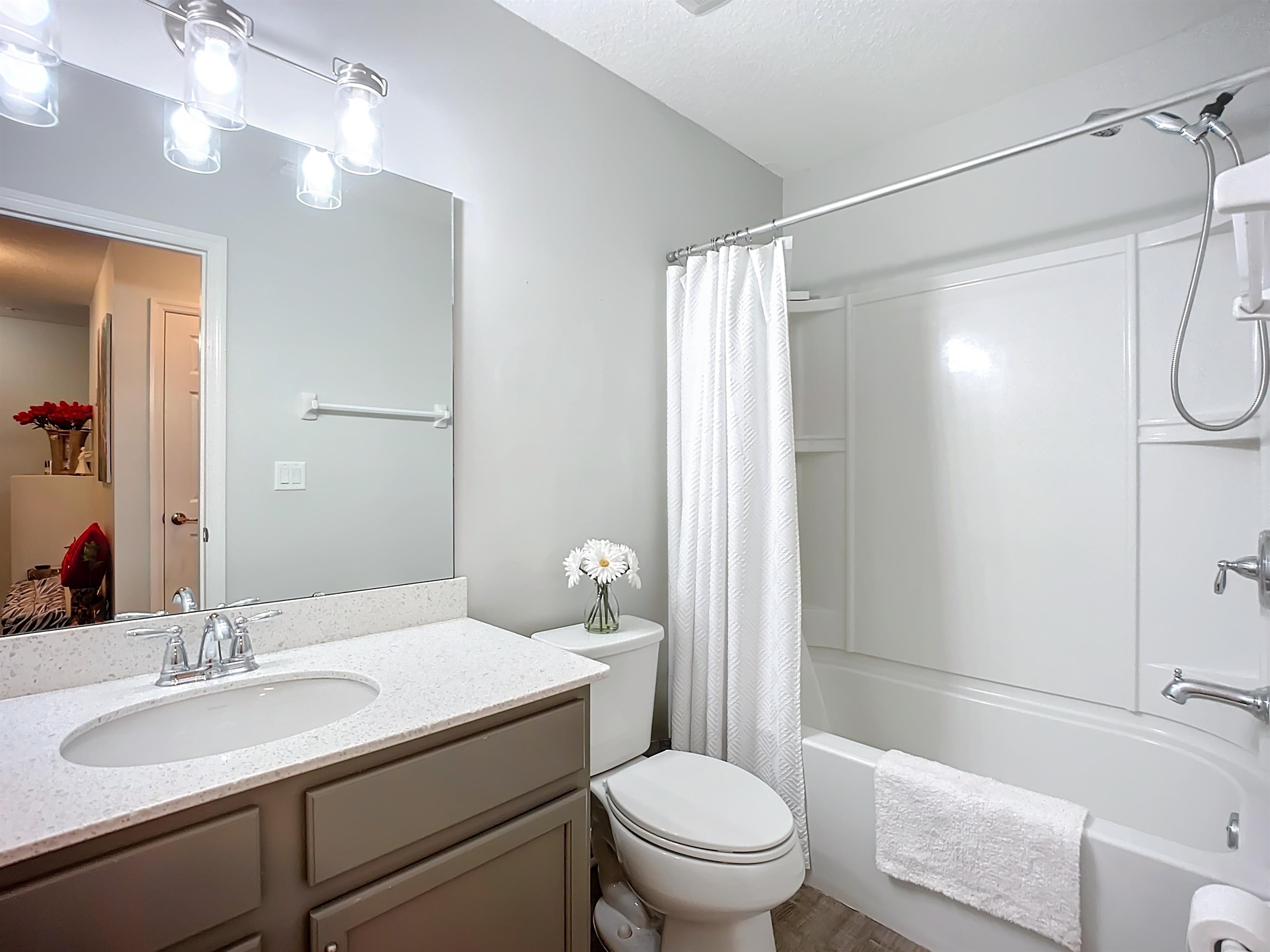 193 Paradas Place St. Augustine, FL 32092 - Photo 23 of 44 a bathroom with a sink toilet vanity and shower