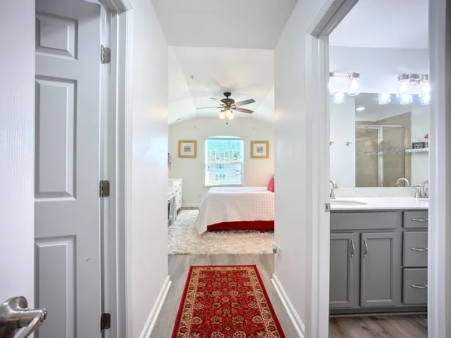 a living room with a bed and a couch