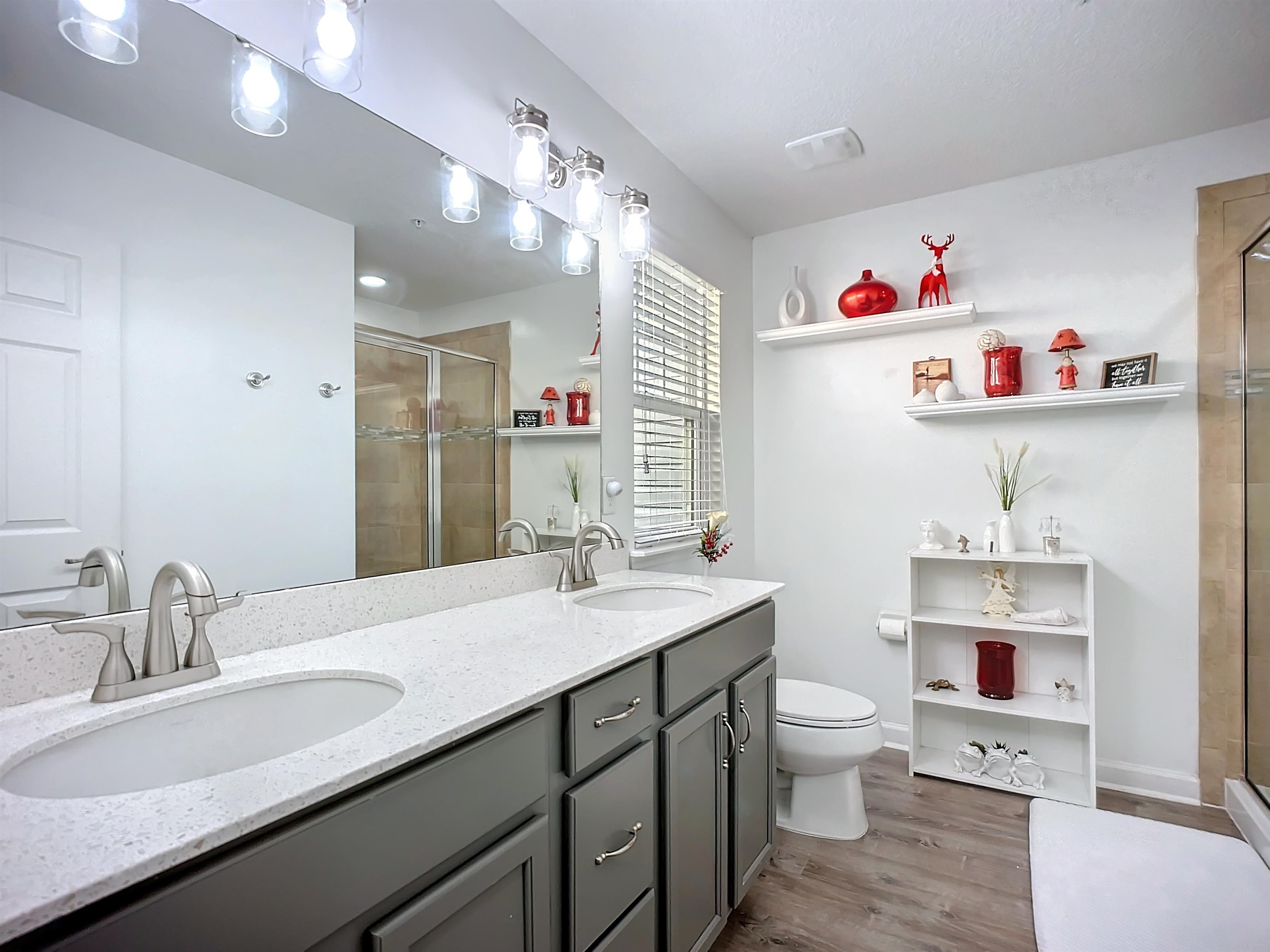 193 Paradas Place St. Augustine, FL 32092 - Photo 30 of 44 a bathroom with a sink a toilet and a mirror