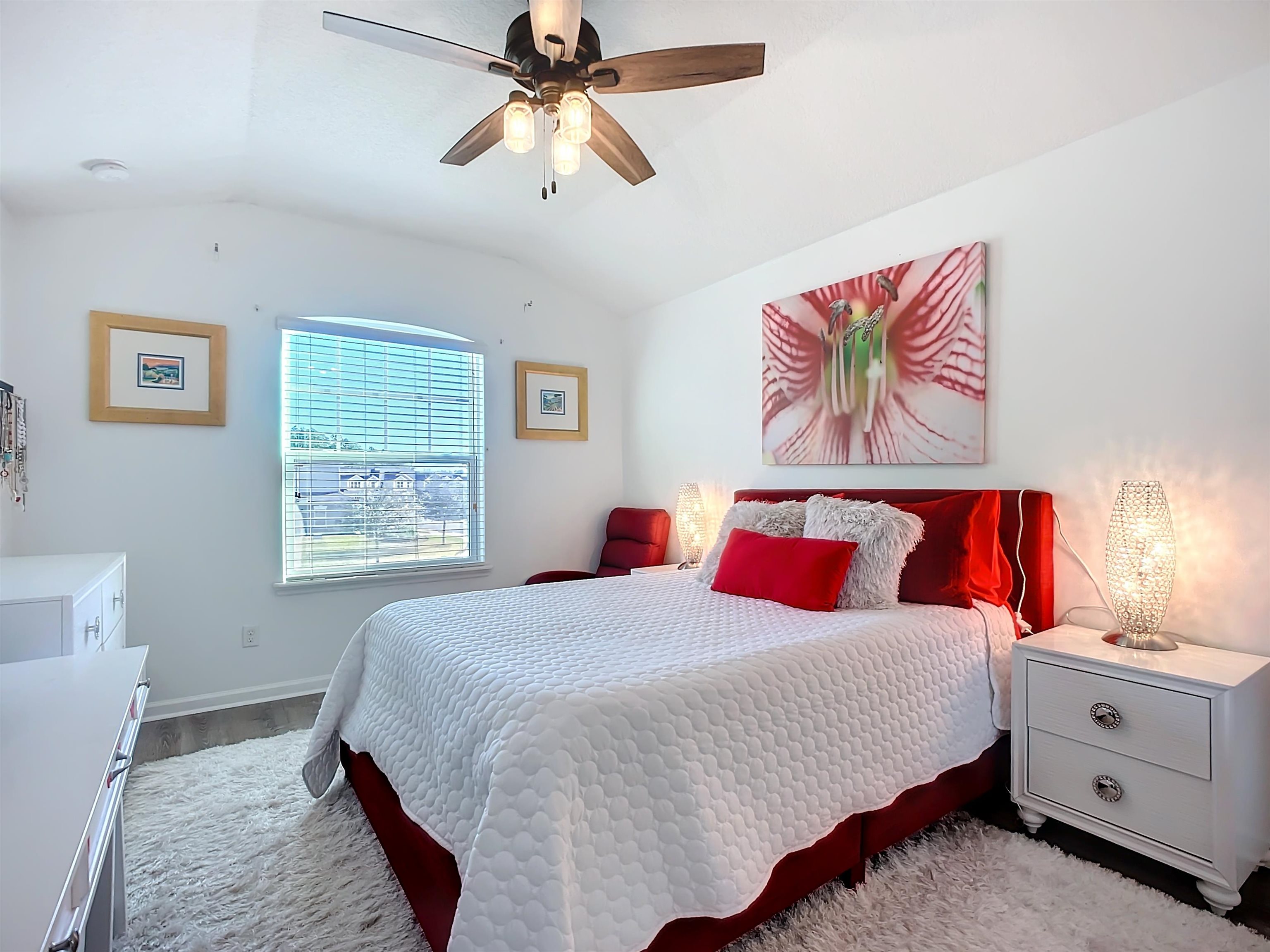 193 Paradas Place St. Augustine, FL 32092 - Photo 33 of 44 a bedroom with a bed and a chandelier