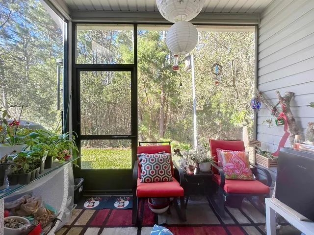 a outdoor living space with furniture and a potted plant