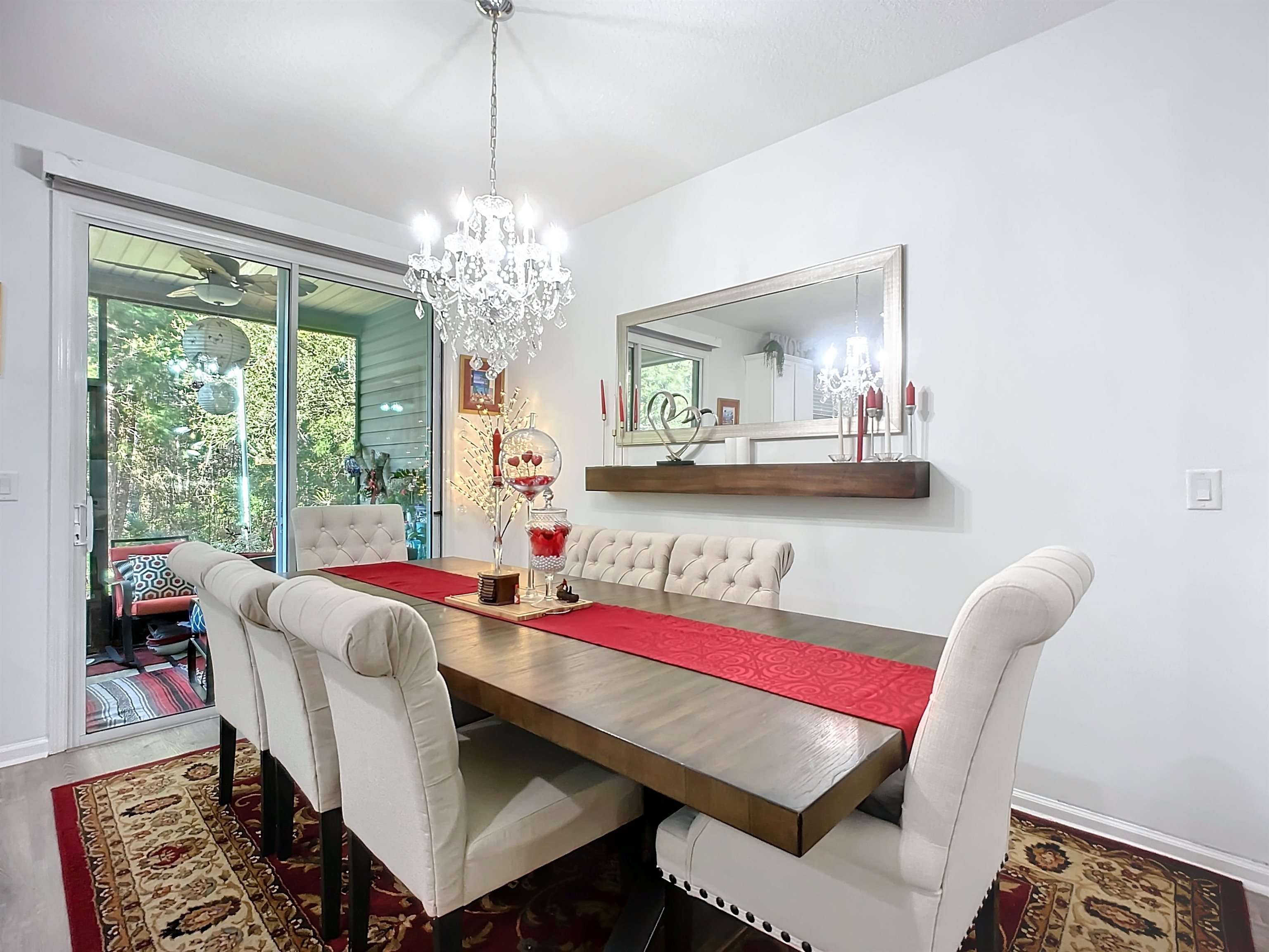 193 Paradas Place St. Augustine, FL 32092 - Photo 7 of 44 a living room with furniture and a chandelier