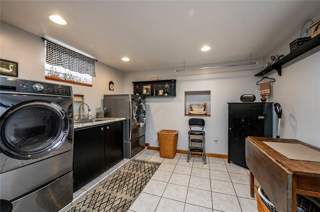 934 Pleasant Valley Road Mount Pleasant, PA 15666 - Photo 17 of 25 a kitchen with a refrigerator and a stove top oven
