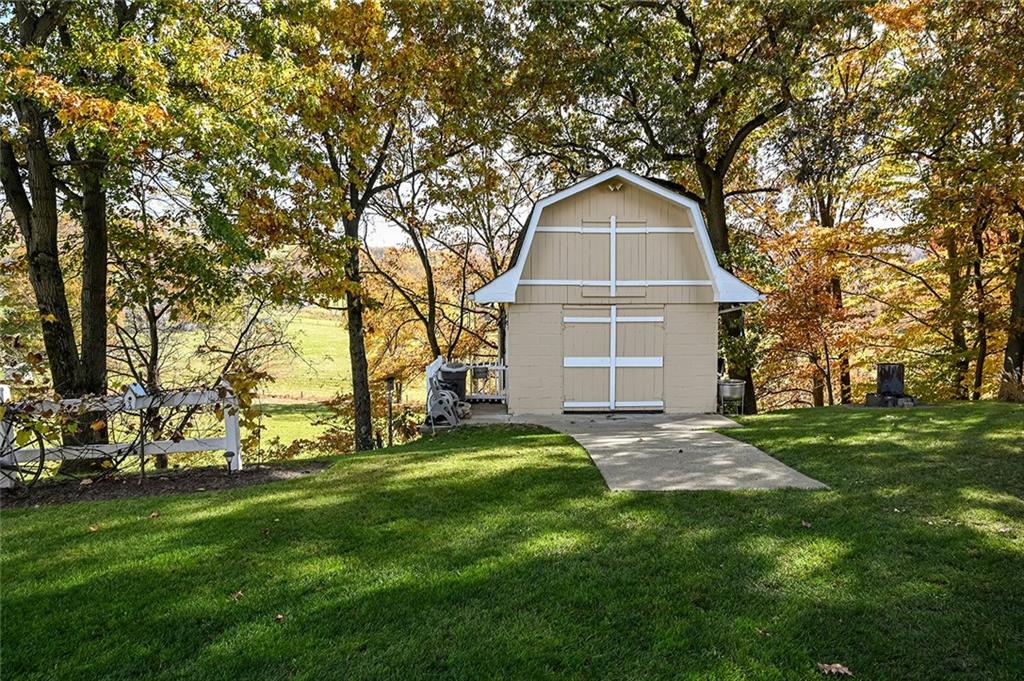 934 Pleasant Valley Road Mount Pleasant, PA 15666 - Photo 21 of 25 a front view of house with yard and green space