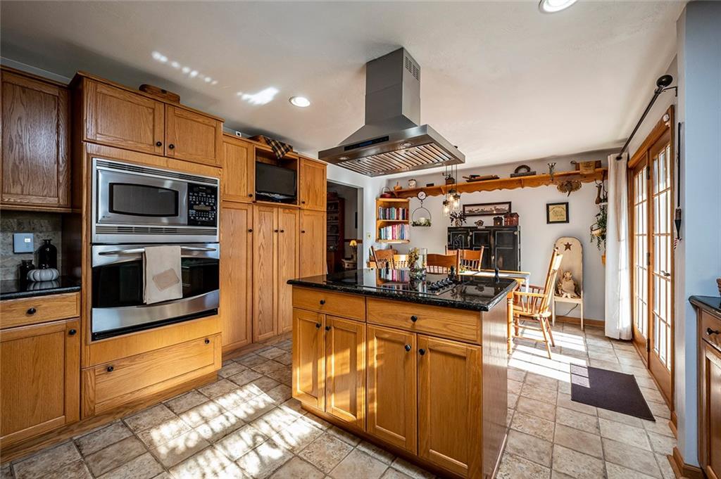 934 Pleasant Valley Road Mount Pleasant, PA 15666 - Photo 5 of 25 a kitchen with stainless steel appliances granite countertop a refrigerator and a stove top oven