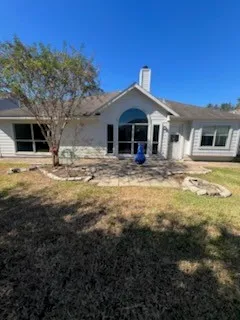 a front view of a house with yard