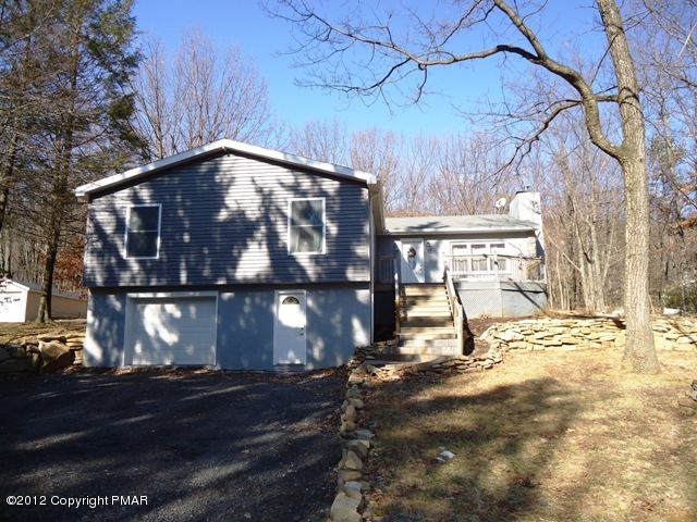 1415 Davids Road Effort, PA 18330 - Photo 1 of 35 a view of backyard with wooden fence