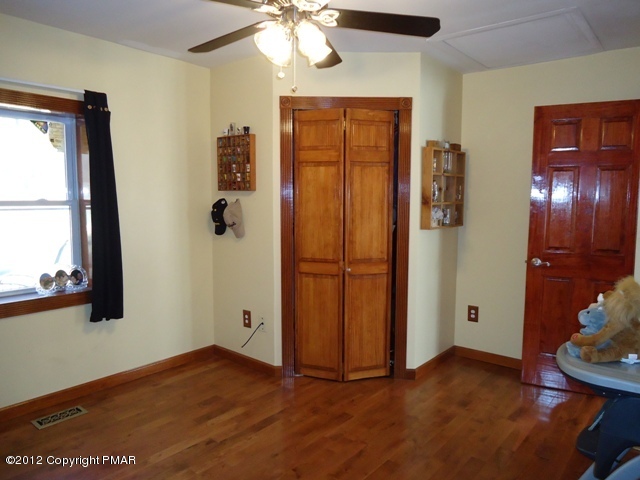 1415 Davids Road Effort, PA 18330 - Photo 23 of 35 wooden floor in an empty room with a window