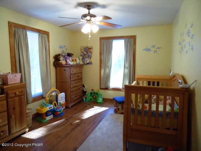 1415 Davids Road Effort, PA 18330 - Photo 25 of 35 a bedroom with furniture and a window