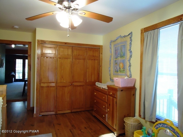1415 Davids Road Effort, PA 18330 - Photo 26 of 35 a room with wooden floor and furniture
