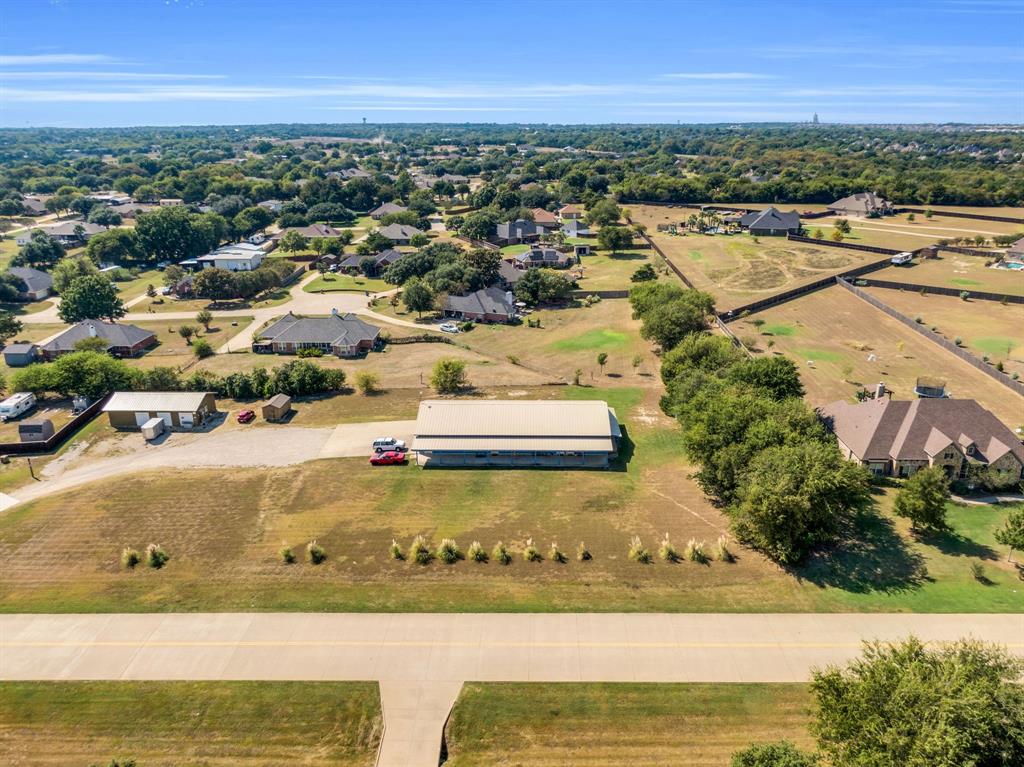 3841 Ledgestone Lane Midlothian, TX 76065 - Photo 16 of 26 an aerial view of residential houses with outdoor space