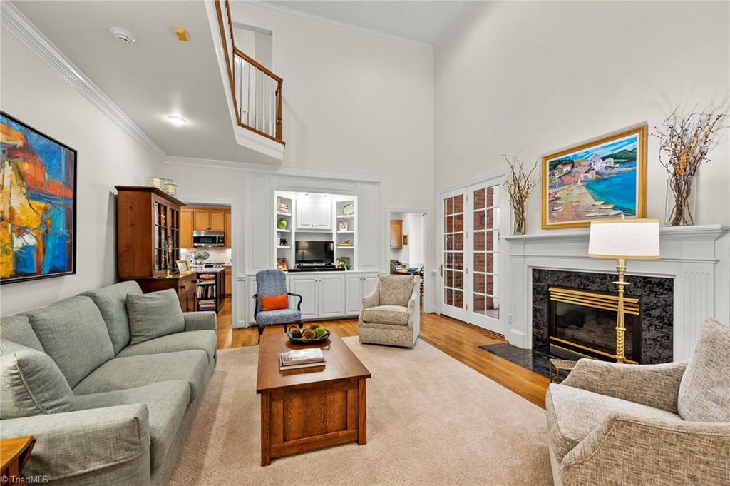 1457 Ridgemere Lane Winston-Salem, NC 27106 - Photo 11 of 39 The den has a gas fireplace