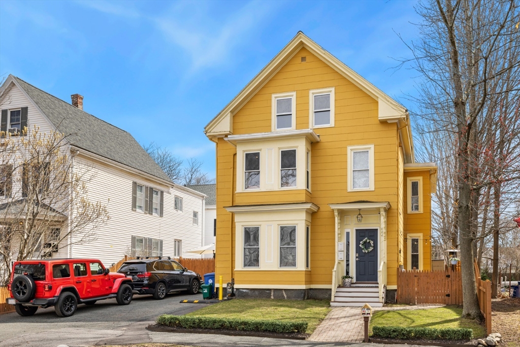 a view of a street with cars
