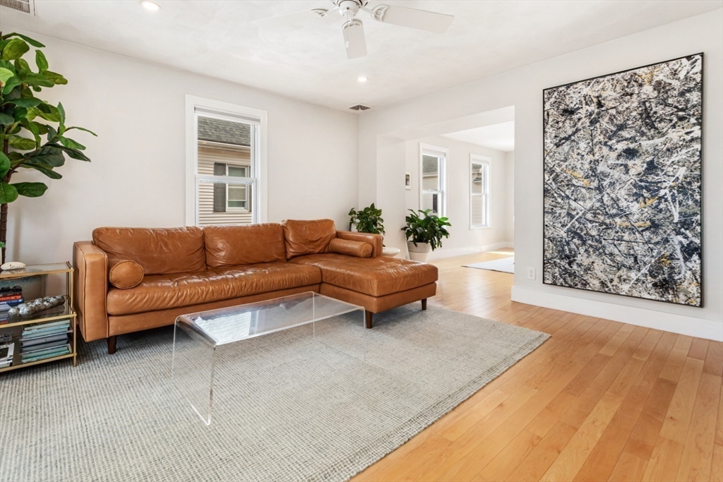 52 Chestnut Street Wakefield, MA 01880 - Photo 11 of 42 a living room with furniture and a window