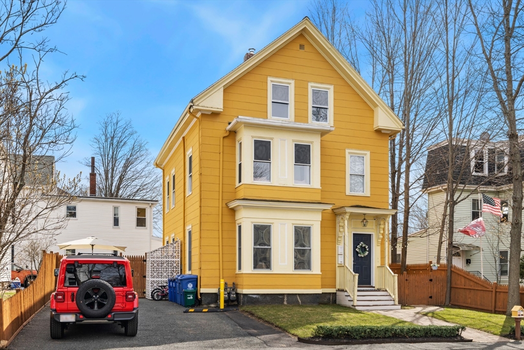 52 Chestnut Street Wakefield, MA 01880 - Photo 2 of 42 a view of building with cars parked
