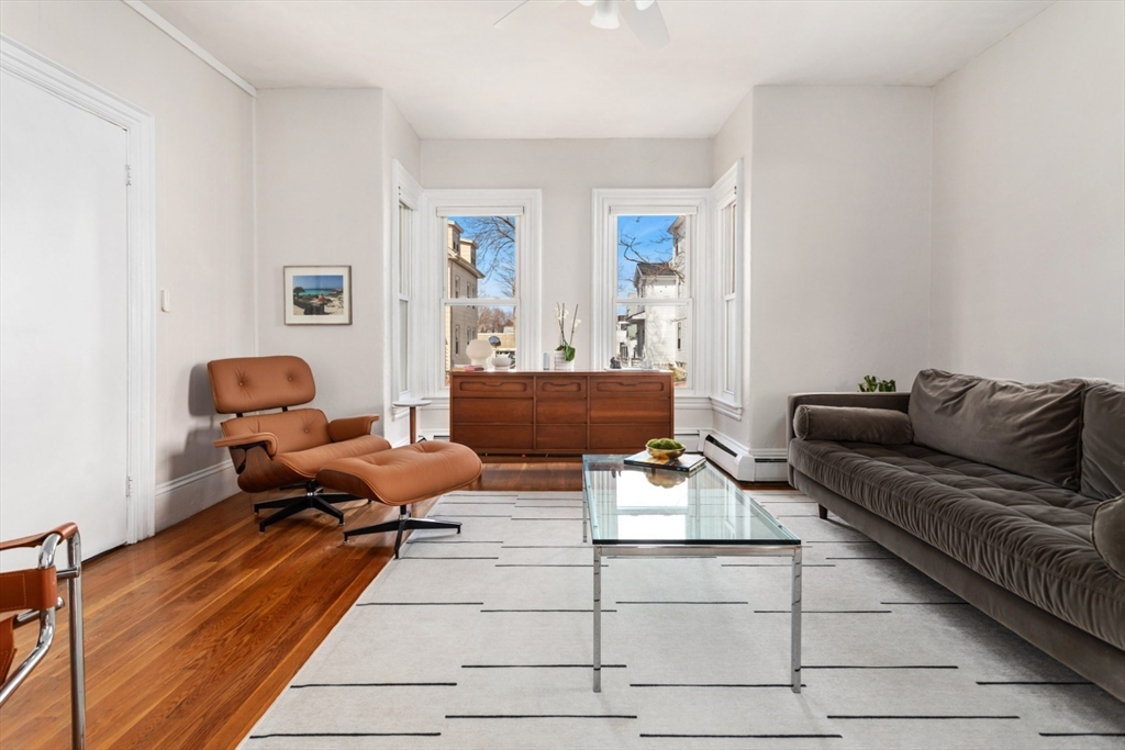 52 Chestnut Street Wakefield, MA 01880 - Photo 28 of 42 a living room with furniture and a rug