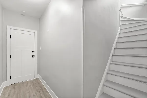 a view of entryway with stairs