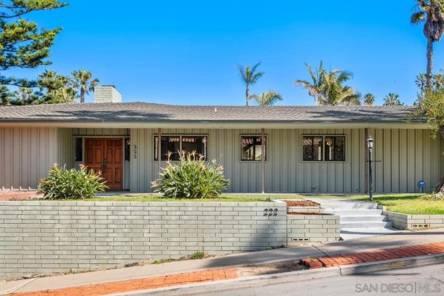 a view of swimming pool with outdoor seating and plants