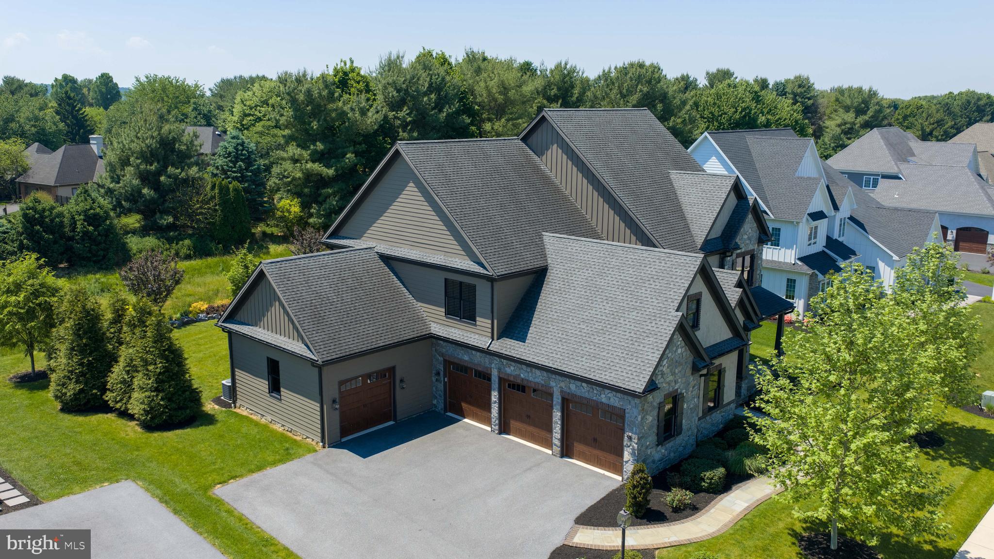 428 Southampton Drive Lititz, PA 17543 - Photo 59 of 60 an aerial view of a house with a yard table and chairs