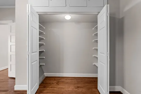 a view of a room with racks on the wall