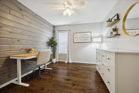 a bed room with a bed and a dresser