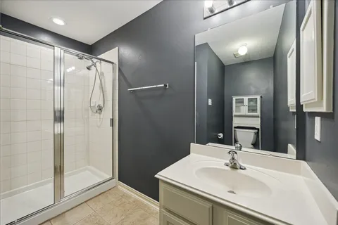 a utility room with closet dryer and washer