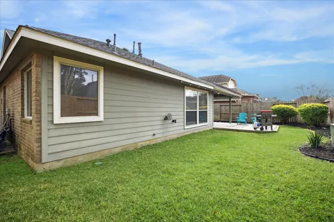a view of a park with swings and a table