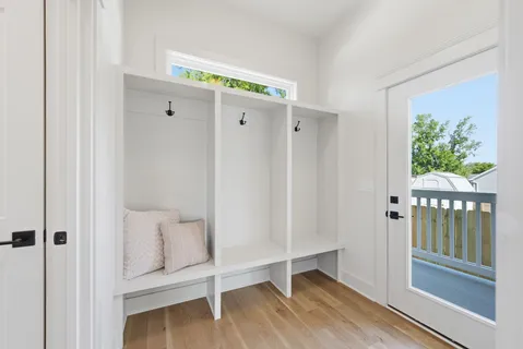a view of entryway with wooden floor