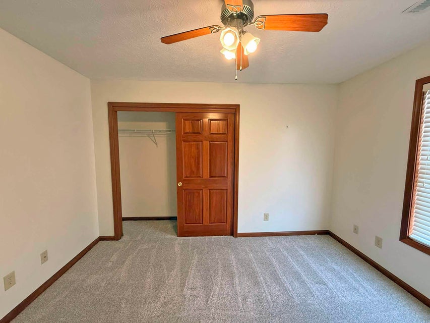 541 North Point Troy, OH 45373 - Photo 15 of 23 This spacious bedroom offers comfortable carpeting and a convenient sliding closet door.