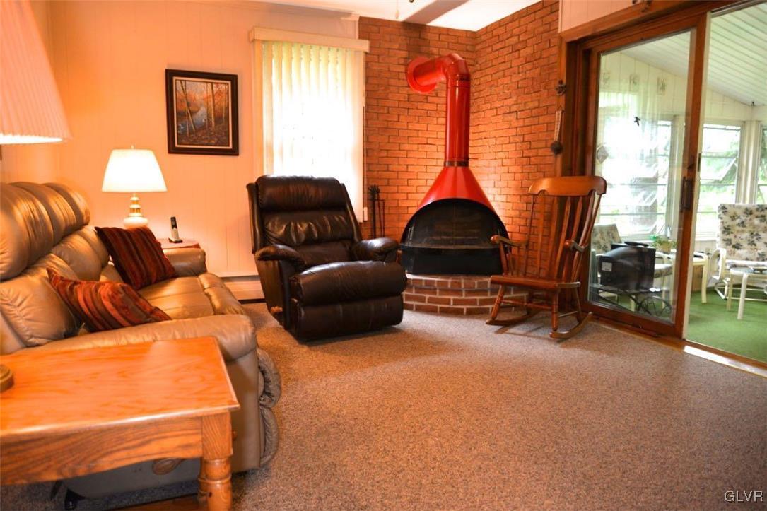 2230 Church Road Bethlehem, PA 18015 - Photo 13 of 32 CHECK OUT THE FAMILY ROOM'S COOL WOOD-BURNING FIRE